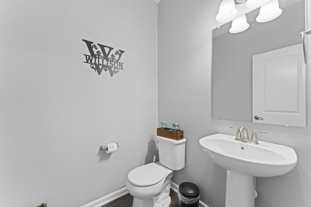185 Saffron Dr, Sunbury, OH 43074 - bathroom with toilet, wood finished floors, and baseboards