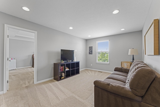 185 Saffron Dr, Sunbury, OH 43074 - living area featuring light colored carpet, baseboards, and recessed lighting