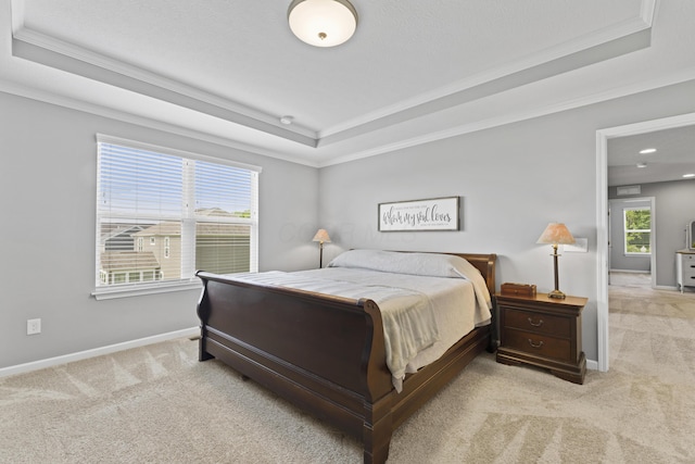 185 Saffron Dr, Sunbury, OH 43074 - bedroom featuring a raised ceiling, light colored carpet, ornamental molding, baseboards, and recessed lighting