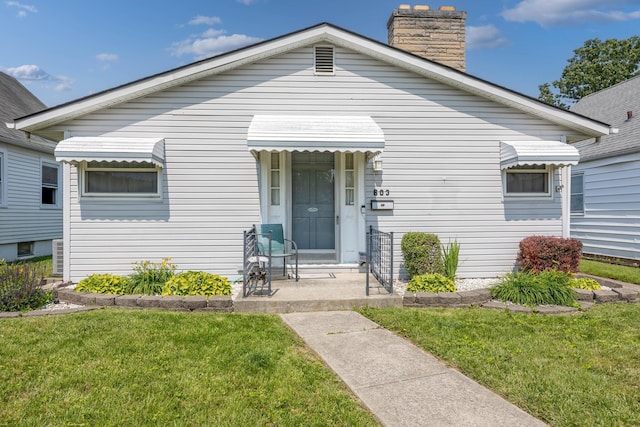 803 Wiltshire Rd, Columbus, OH 43204 - view of front of property featuring a front yard and a chimney