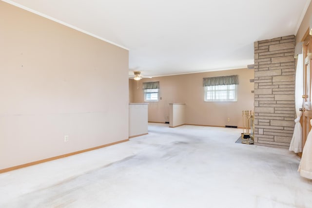 803 Wiltshire Rd, Columbus, OH 43204 - spare room with baseboards, crown molding, light colored carpet, and ceiling fan