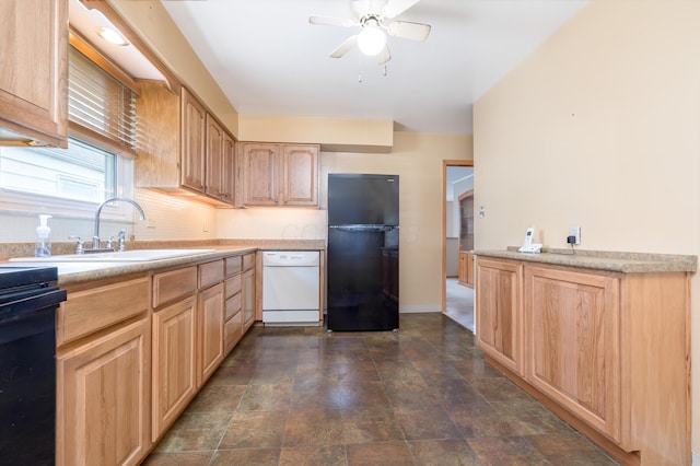 803 Wiltshire Rd, Columbus, OH 43204 - kitchen featuring freestanding refrigerator, dishwasher, a sink, light brown cabinetry, and ceiling fan