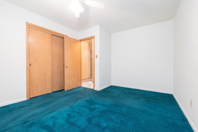 803 Wiltshire Rd, Columbus, OH 43204 - unfurnished bedroom with carpet flooring, baseboards, ceiling fan, and a closet