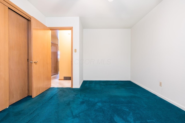 803 Wiltshire Rd, Columbus, OH 43204 - unfurnished bedroom featuring carpet, baseboards, and a closet