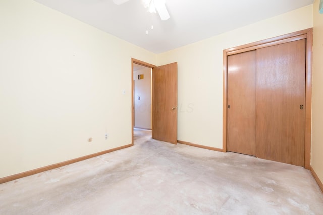803 Wiltshire Rd, Columbus, OH 43204 - unfurnished bedroom featuring a closet, baseboards, a ceiling fan, and light carpet