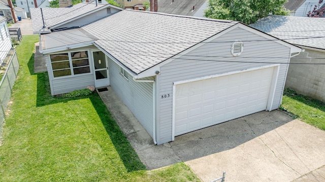 803 Wiltshire Rd, Columbus, OH 43204 - view of home's exterior featuring a shingled roof and an attached garage