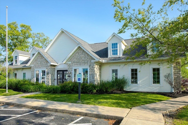 139 Preswicke Ml, Blacklick, OH 43004 - view of front of property with stone siding, uncovered parking, and a front yard