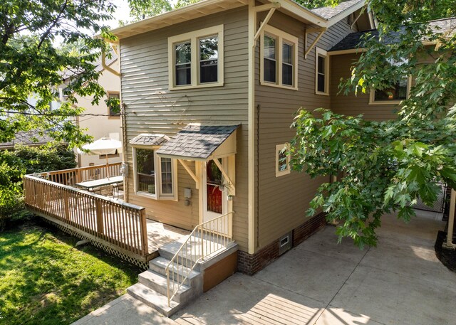 203 Winthrop Rd, Columbus, OH 43214 - rear view of house with a wooden deck and a shingled roof