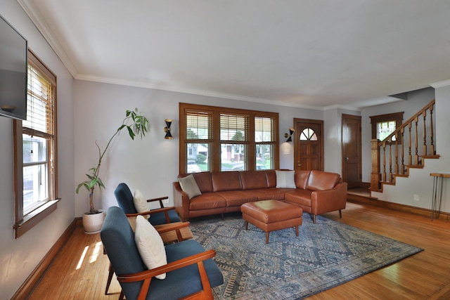 203 Winthrop Rd, Columbus, OH 43214 - living area with wood finished floors, baseboards, stairs, and crown molding