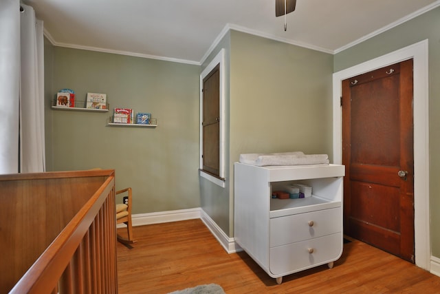 203 Winthrop Rd, Columbus, OH 43214 - corridor with wood finished floors, baseboards, and crown molding