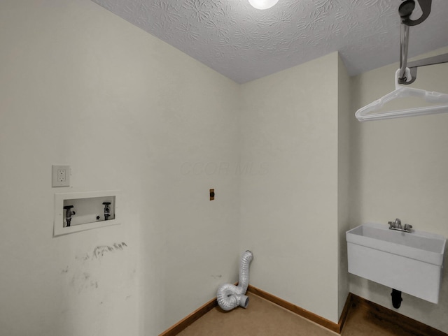 8587 Blacks Rd, Pataskala, OH 43062 - washroom with hookup for a washing machine, electric dryer hookup, baseboards, carpet, and a textured ceiling