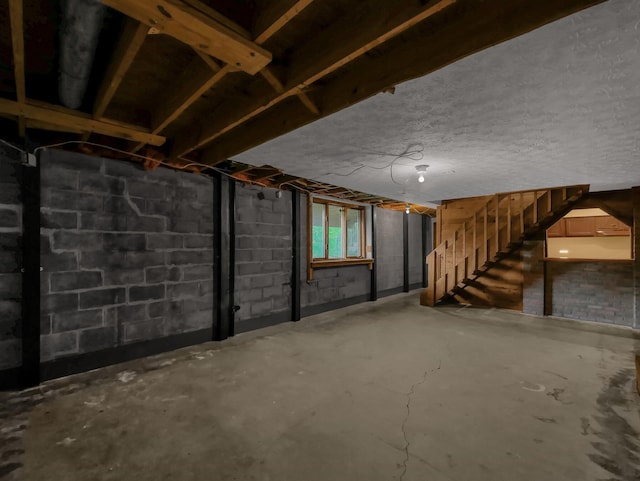 8587 Blacks Rd, Pataskala, OH 43062 - basement featuring stairway and concrete block wall