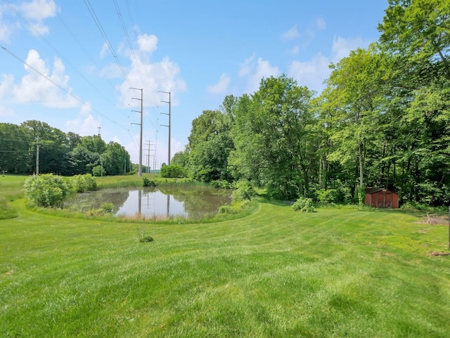 8587 Blacks Rd, Pataskala, OH 43062 - view of green lawn featuring a water view
