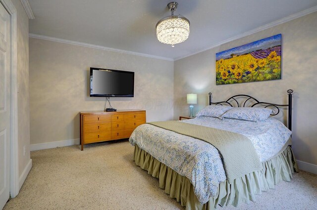 651 S 6th St, Columbus, OH 43206 - bedroom featuring carpet floors, a chandelier, baseboards, and ornamental molding