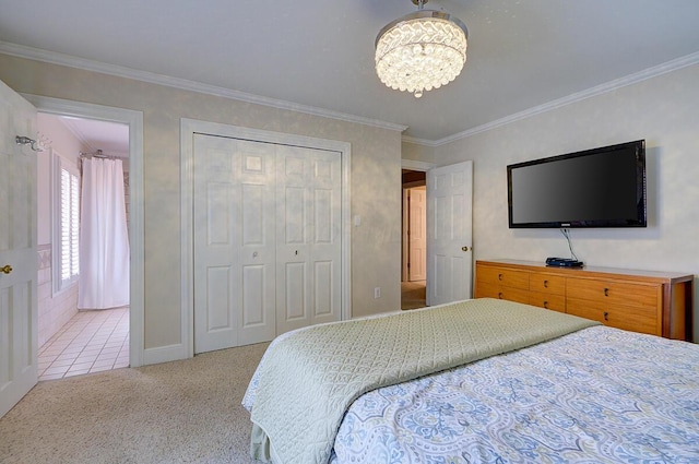 651 S 6th St, Columbus, OH 43206 - carpeted bedroom featuring a chandelier, a closet, crown molding, and baseboards