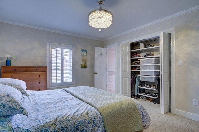 651 S 6th St, Columbus, OH 43206 - carpeted bedroom featuring a chandelier, a closet, baseboards, and crown molding