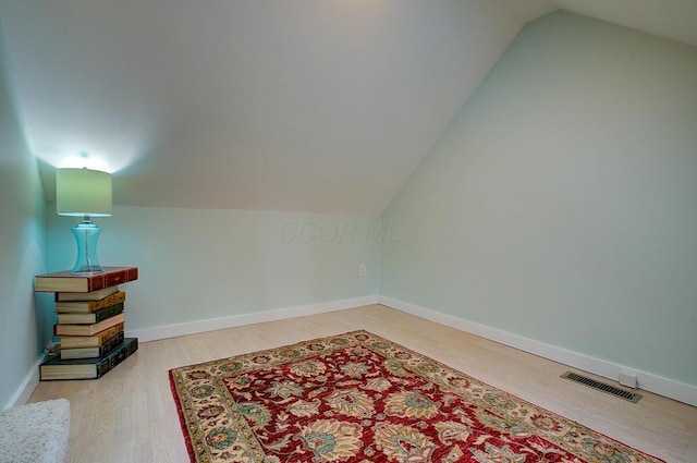 651 S 6th St, Columbus, OH 43206 - bonus room with wood finished floors, lofted ceiling, and baseboards