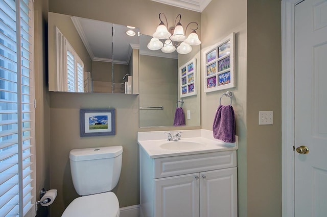 651 S 6th St, Columbus, OH 43206 - bathroom with ornamental molding, vanity, toilet, and a chandelier