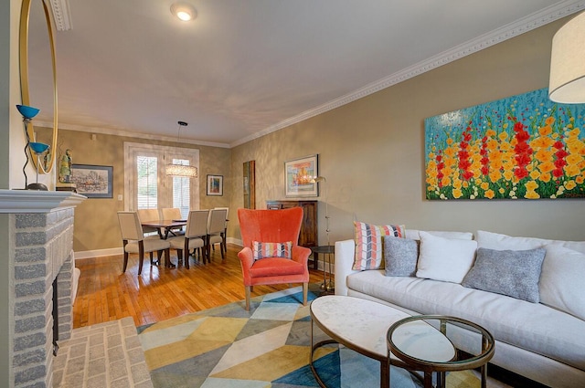 651 S 6th St, Columbus, OH 43206 - living room featuring wood finished floors, baseboards, and ornamental molding
