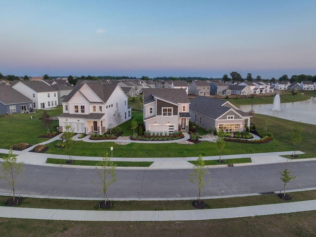 3832 Old Glory Loop, Powell, OH 43065 - aerial view at dusk of a residential view and a water view