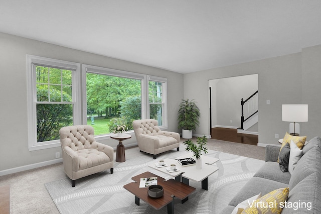 6233 Coonpath Rd NW, Carroll, OH 43112 - carpeted living area featuring stairway and baseboards