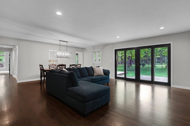 6233 Coonpath Rd NW, Carroll, OH 43112 - living area featuring dark wood finished floors, recessed lighting, and a chandelier