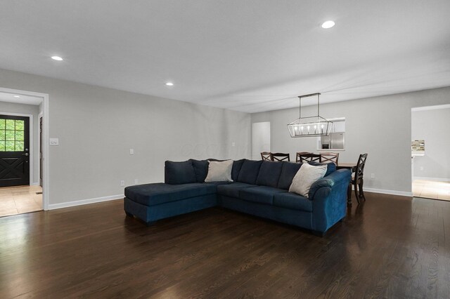 6233 Coonpath Rd NW, Carroll, OH 43112 - living area featuring dark wood-style floors and recessed lighting