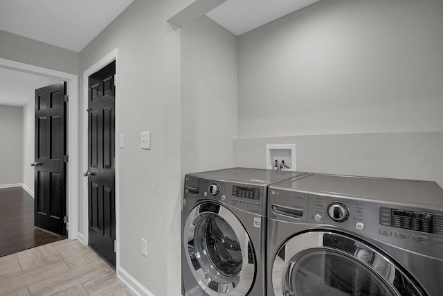 6233 Coonpath Rd NW, Carroll, OH 43112 - washroom featuring separate washer and dryer and baseboards