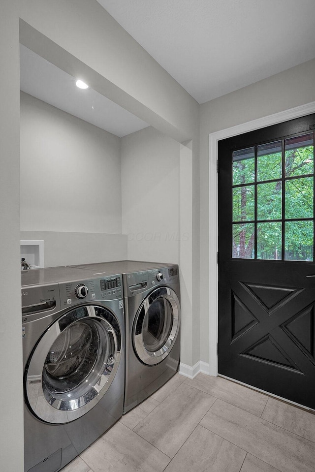 6233 Coonpath Rd NW, Carroll, OH 43112 - washroom with independent washer and dryer and baseboards