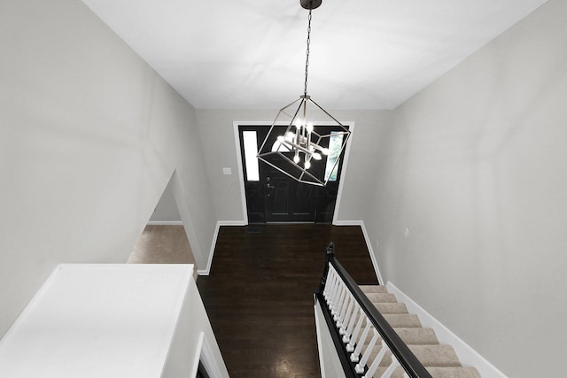 6233 Coonpath Rd NW, Carroll, OH 43112 - entrance foyer with a chandelier and dark wood-style flooring