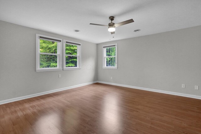 6233 Coonpath Rd NW, Carroll, OH 43112 - unfurnished room with wood finished floors and ceiling fan