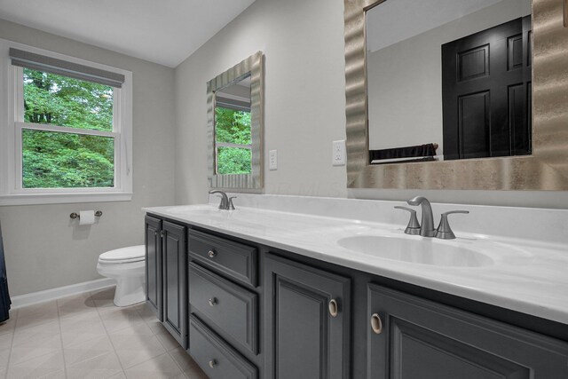 6233 Coonpath Rd NW, Carroll, OH 43112 - bathroom with double vanity and tile patterned floors