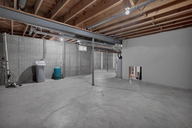 6233 Coonpath Rd NW, Carroll, OH 43112 - unfinished basement featuring a water pressure tank, a water softener, and gas water heater