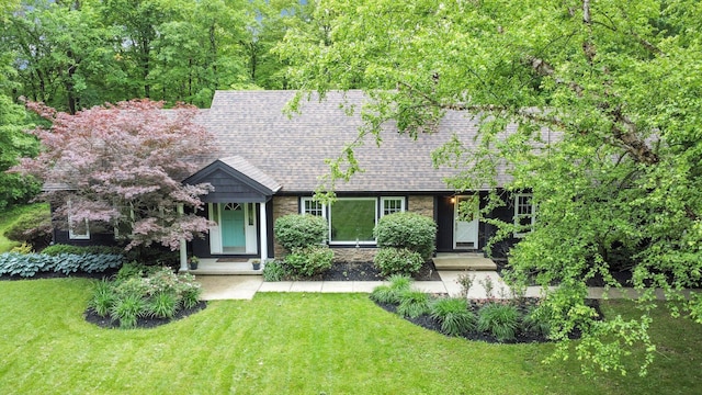 6233 Coonpath Rd NW, Carroll, OH 43112 - view of front facade featuring a front lawn and a shingled roof