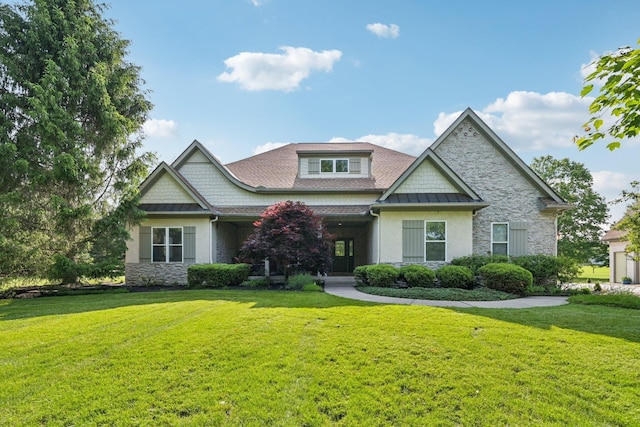 5337 Teresas Trl, Galena, OH 43021 - craftsman-style house with stone siding, a front lawn, a standing seam roof, and metal roof