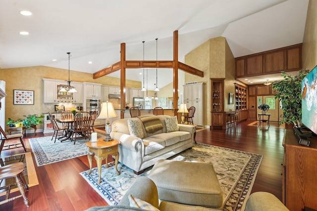 5337 Teresas Trl, Galena, OH 43021 - living area featuring wood finished floors, high vaulted ceiling, a chandelier, and recessed lighting