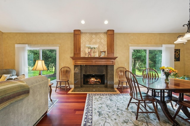 5337 Teresas Trl, Galena, OH 43021 - dining space featuring plenty of natural light, dark wood finished floors, and a fireplace
