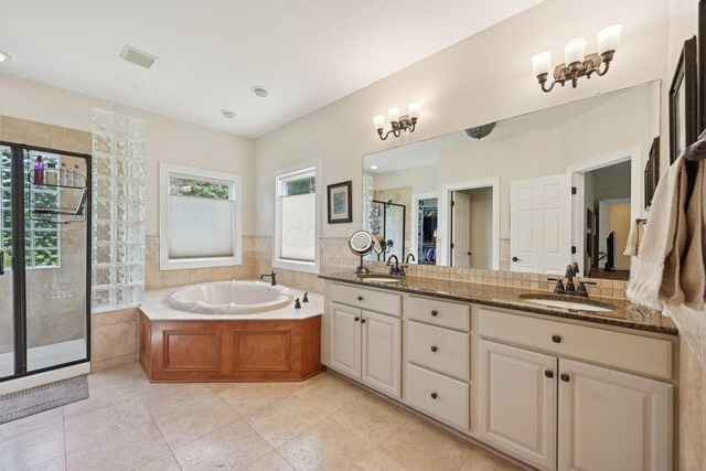 5337 Teresas Trl, Galena, OH 43021 - bathroom with a stall shower, double vanity, and a bath