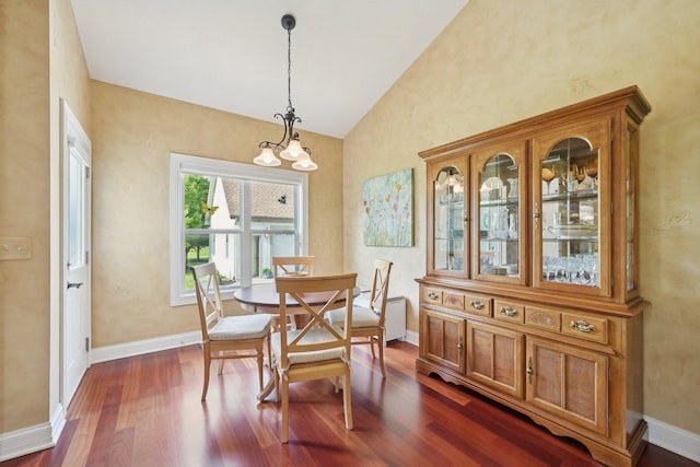 5337 Teresas Trl, Galena, OH 43021 - dining space featuring dark wood-style floors, a chandelier, baseboards, and high vaulted ceiling