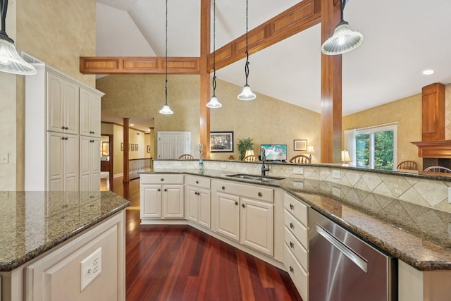 5337 Teresas Trl, Galena, OH 43021 - kitchen featuring a sink, dishwasher, dark wood-style floors, decorative backsplash, and dark stone counters