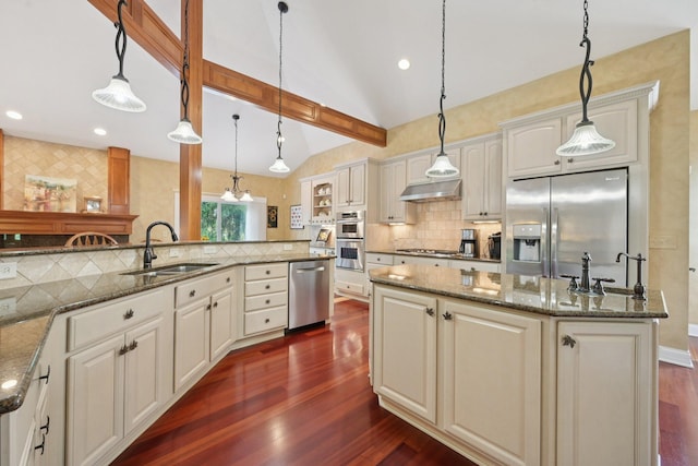 5337 Teresas Trl, Galena, OH 43021 - kitchen with stainless steel appliances, a sink, under cabinet range hood, dark wood finished floors, and decorative backsplash