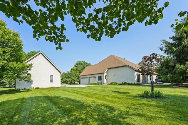 5337 Teresas Trl, Galena, OH 43021 - back of property featuring a lawn and an attached garage