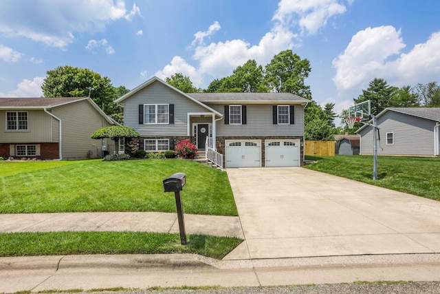 765 Huntley Ave, Logan, OH 43138 - raised ranch with an attached garage, driveway, a front yard, and stone siding