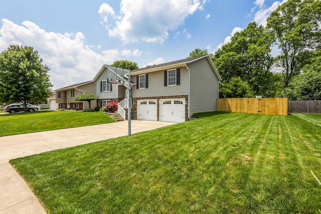 765 Huntley Ave, Logan, OH 43138 - split foyer home with a garage and concrete driveway
