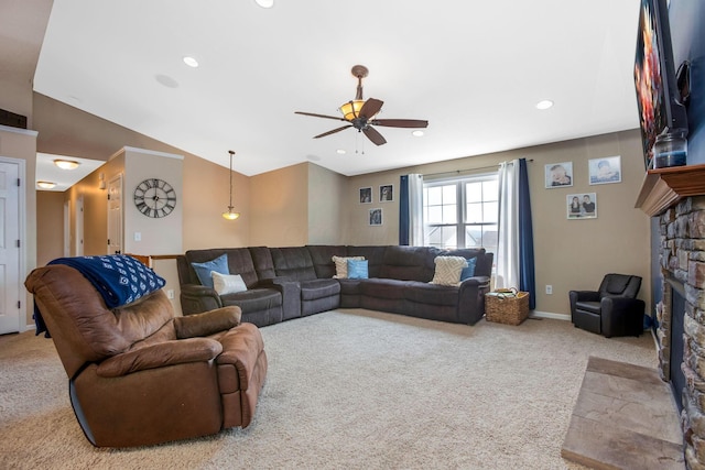 765 Huntley Ave, Logan, OH 43138 - carpeted living area with ceiling fan, a stone fireplace, lofted ceiling, recessed lighting, and baseboards