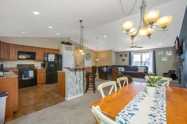 765 Huntley Ave, Logan, OH 43138 - carpeted dining space featuring a chandelier, ceiling fan, recessed lighting, vaulted ceiling, and a sink