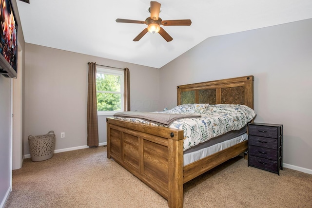 765 Huntley Ave, Logan, OH 43138 - bedroom with light carpet, vaulted ceiling, baseboards, and ceiling fan