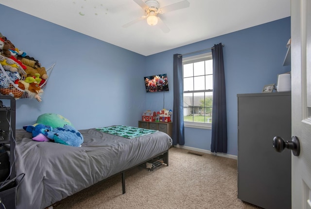 765 Huntley Ave, Logan, OH 43138 - carpeted bedroom featuring baseboards and a ceiling fan