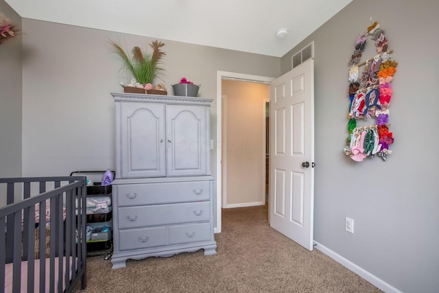 765 Huntley Ave, Logan, OH 43138 - bedroom featuring carpet, baseboards, and a crib