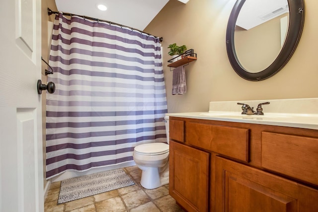 765 Huntley Ave, Logan, OH 43138 - bathroom featuring vanity, toilet, and curtained shower